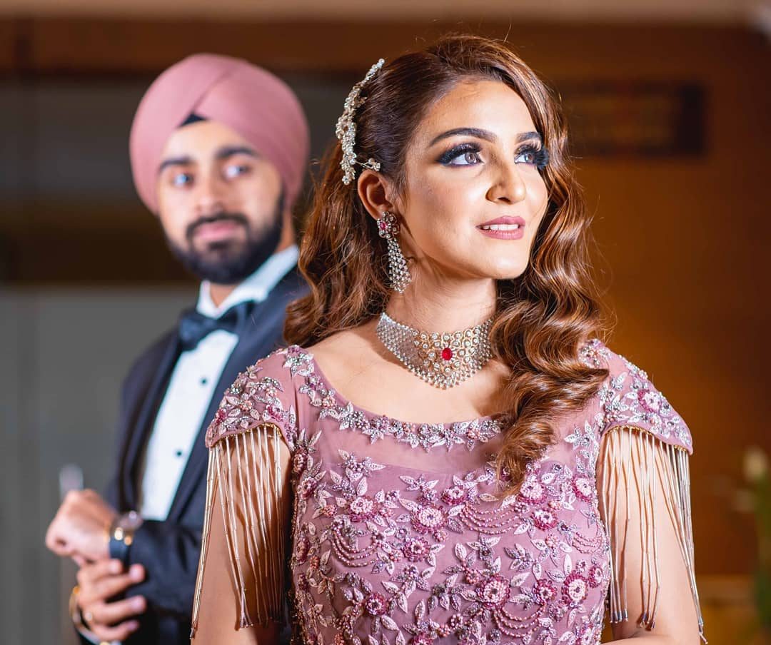 Watch the Bride adorning her Classy Bridal Outfits at her Punjabi Wedding