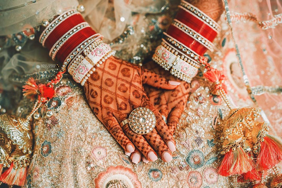 A Lavish Punjabi Wedding with beautiful Bridal Outfits and Flawless Decor
